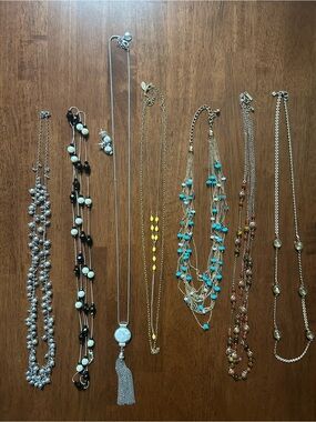 Multiples necklaces, earrings & bracelet.